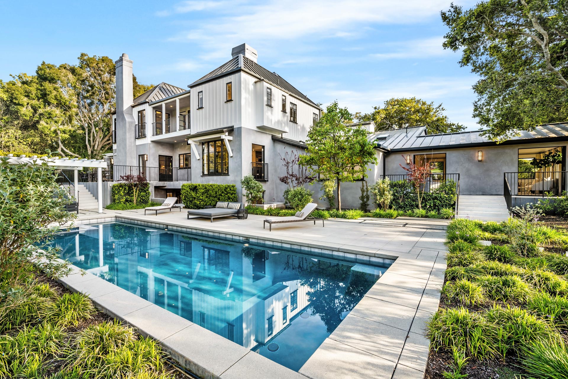 Home with a swimming pool surrounded by trees Home with a swimming pool surrounded by trees